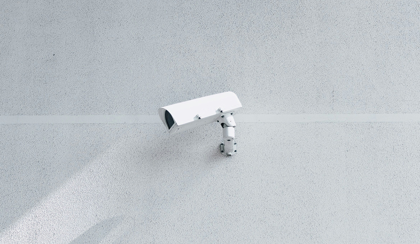 A camera mounted to the side of a wall