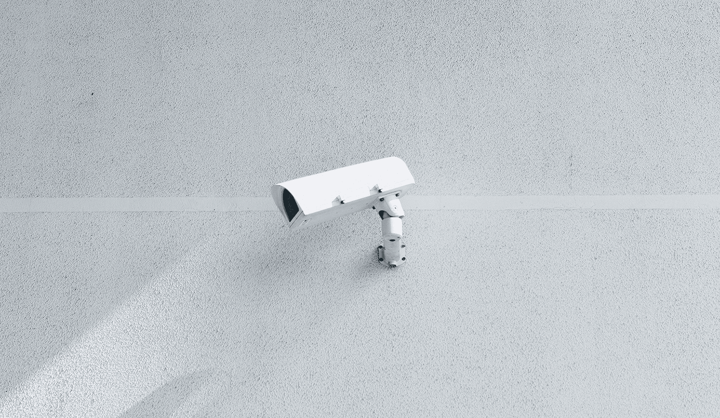 A camera mounted to the side of a wall