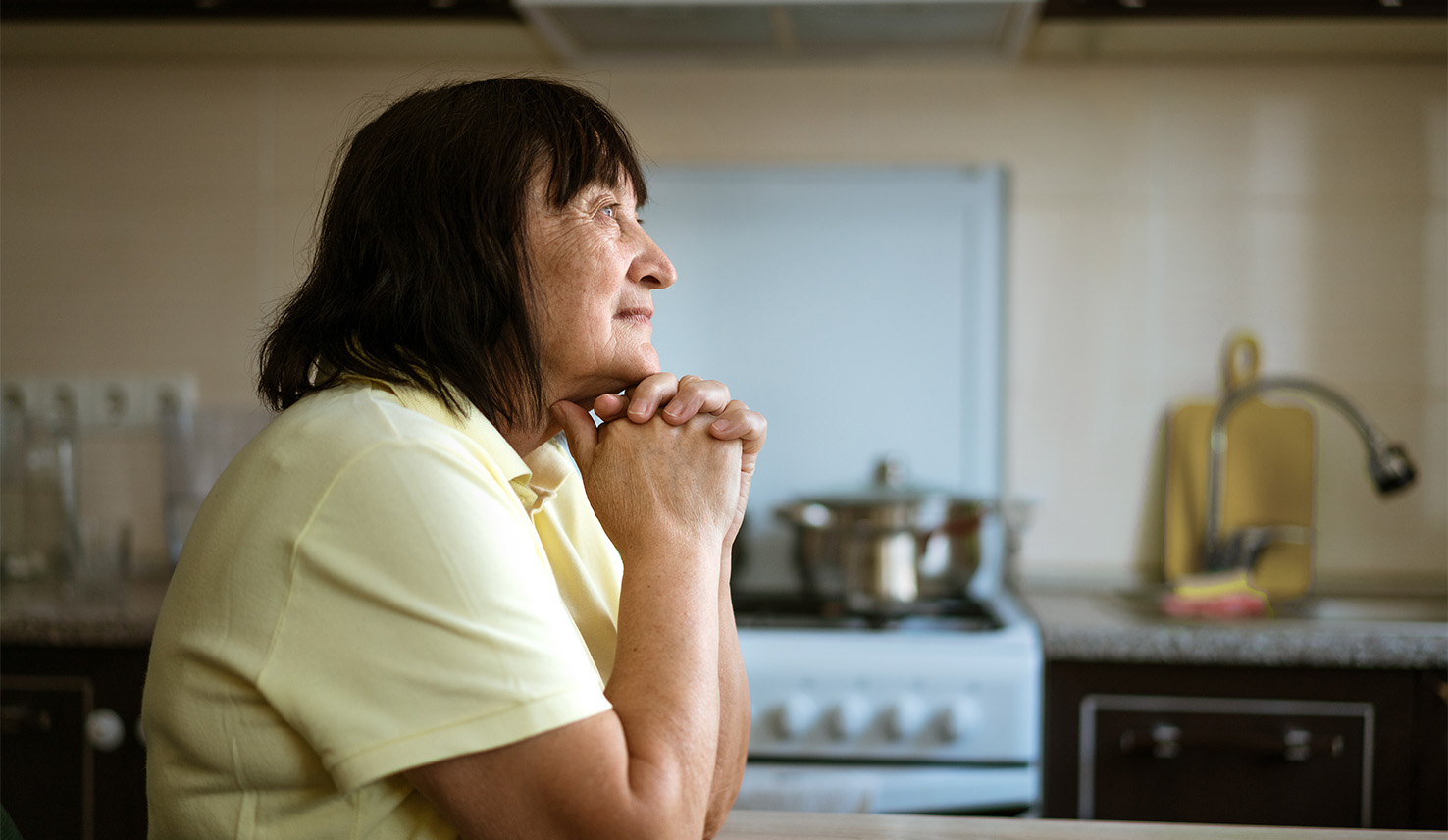 man walking through shadows