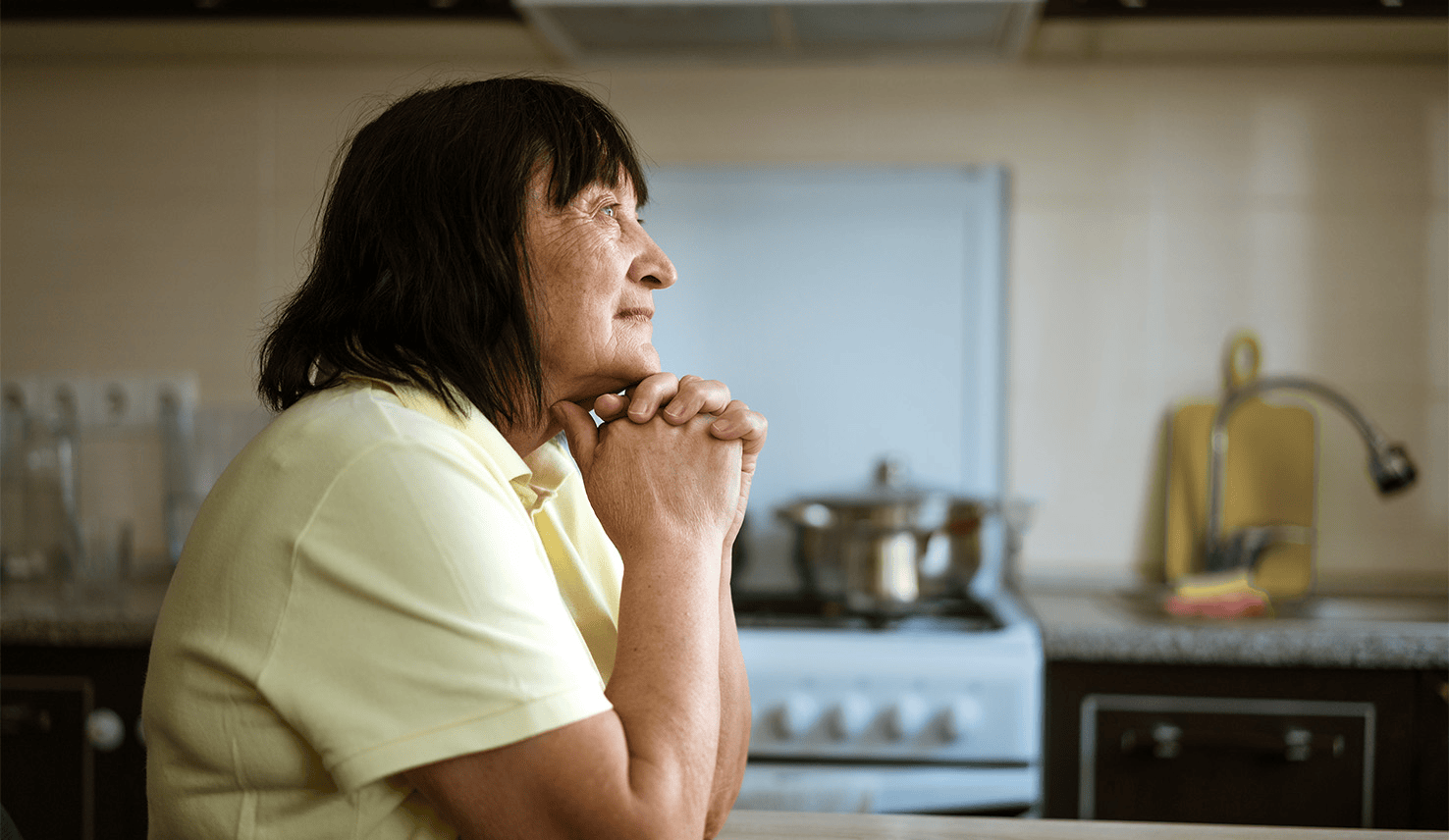 man walking through shadows