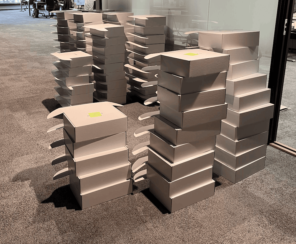 About a hundred and fifty unwrapped boxes